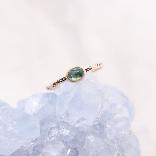 Tourmaline gemstone ring on gold bohemian ring band