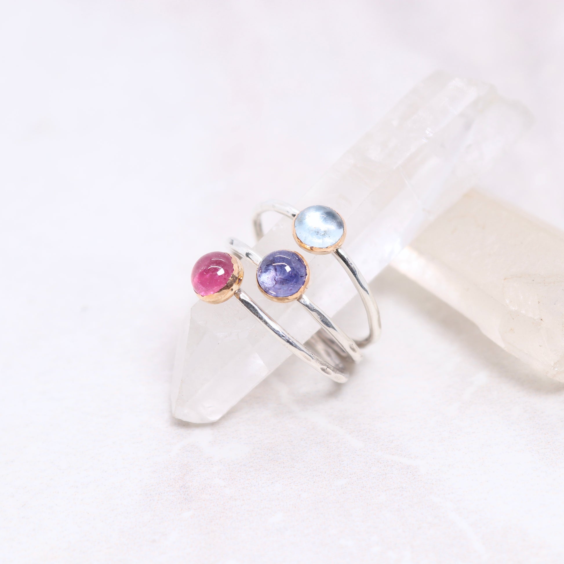 Pink tourmaline, tanzanite, and aquamarine boho mixed metal gemstone rings