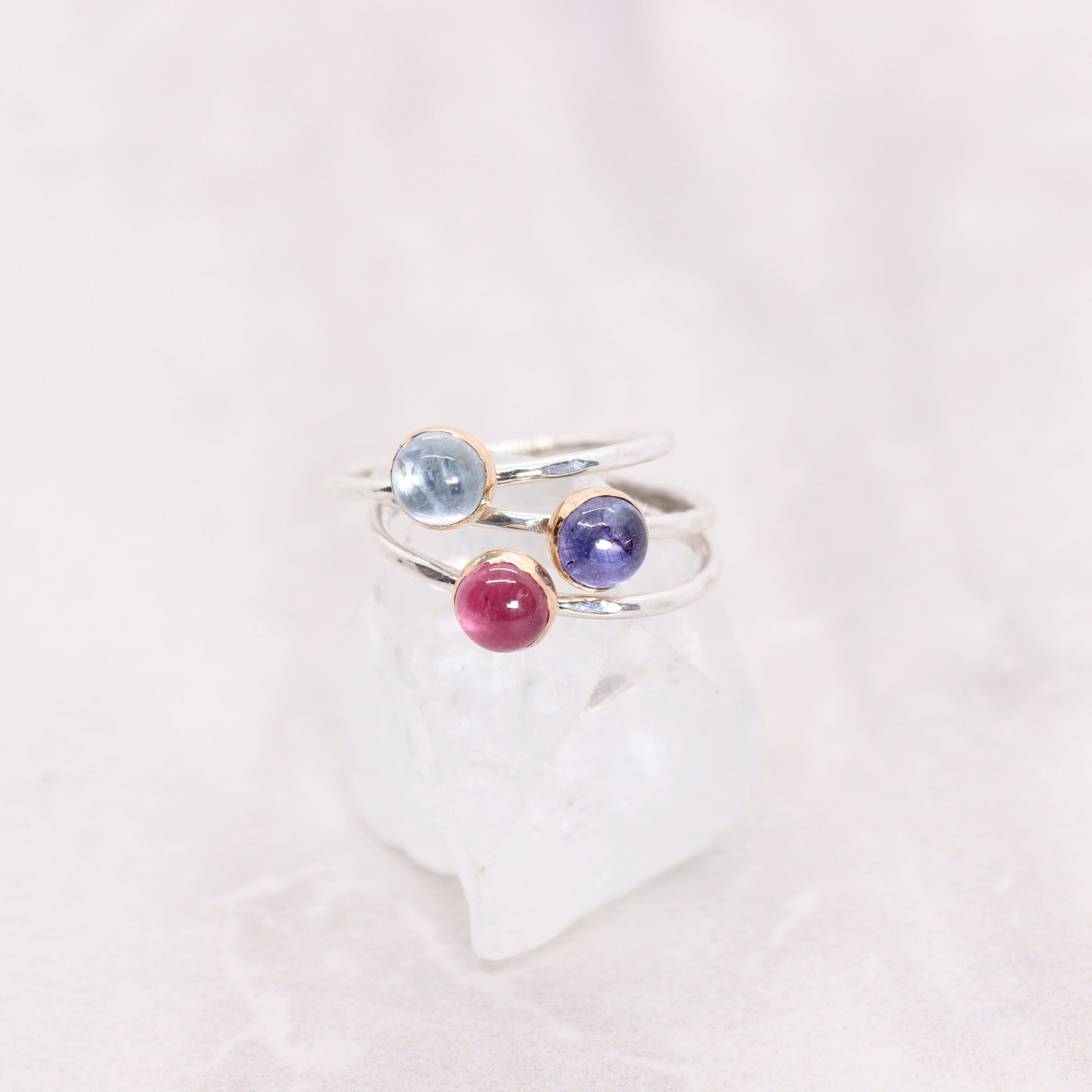 Pink tourmaline, tanzanite, and aquamarine boho mixed metal gemstone ringsPink tourmaline, tanzanite, and aquamarine boho mixed metal gemstone rings