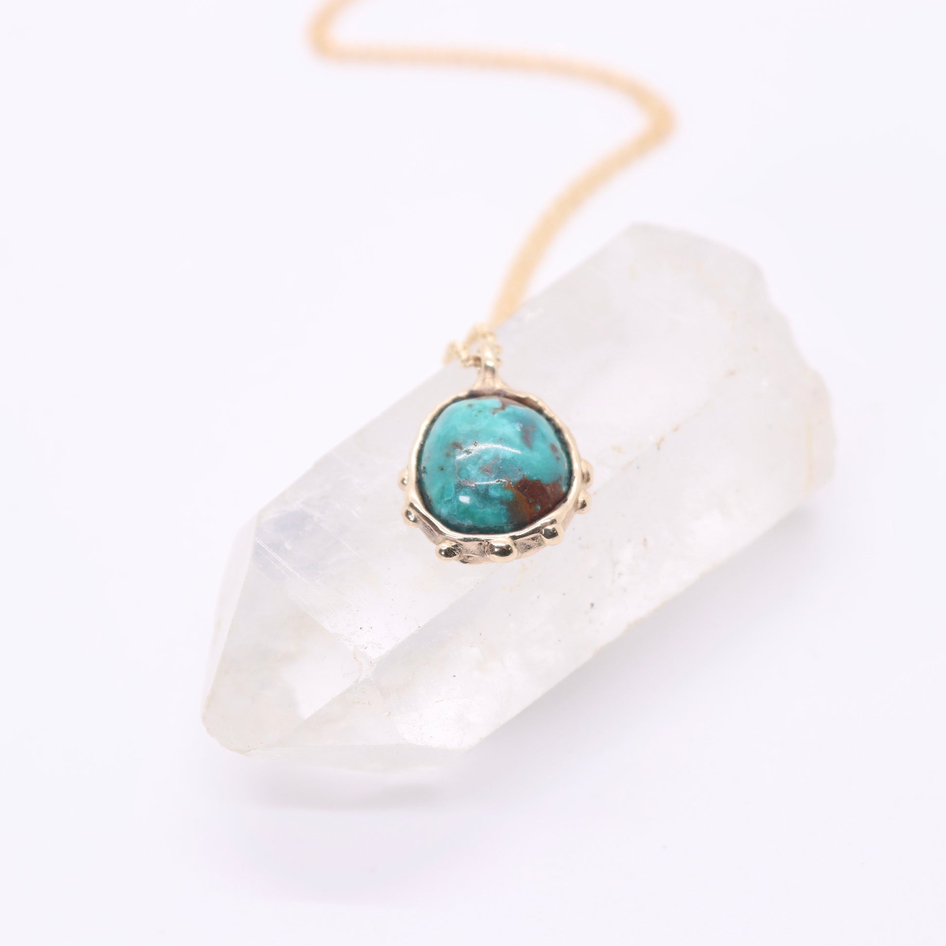 Sierra Nevada turquoise necklace set in solid 14k gold with an organic sculptural bohemian look