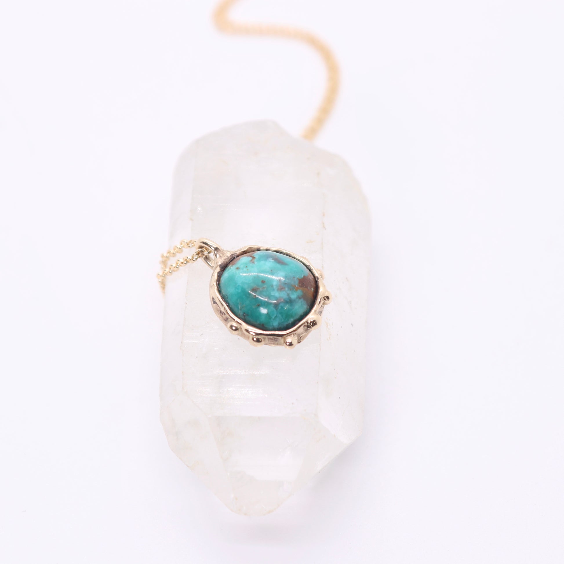 Sierra Nevada turquoise necklace set in solid 14k gold with an organic sculptural bohemian look