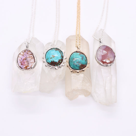 Super 7 melody stone gemstone pendant in organic raw sterling silver