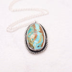 Load image into Gallery viewer, Easter Blue turquoise pendant necklace from Nevada in sterling silver with a boho style
