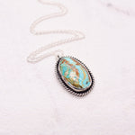 Load image into Gallery viewer, Easter Blue turquoise pendant necklace from Nevada in sterling silver with a boho style
