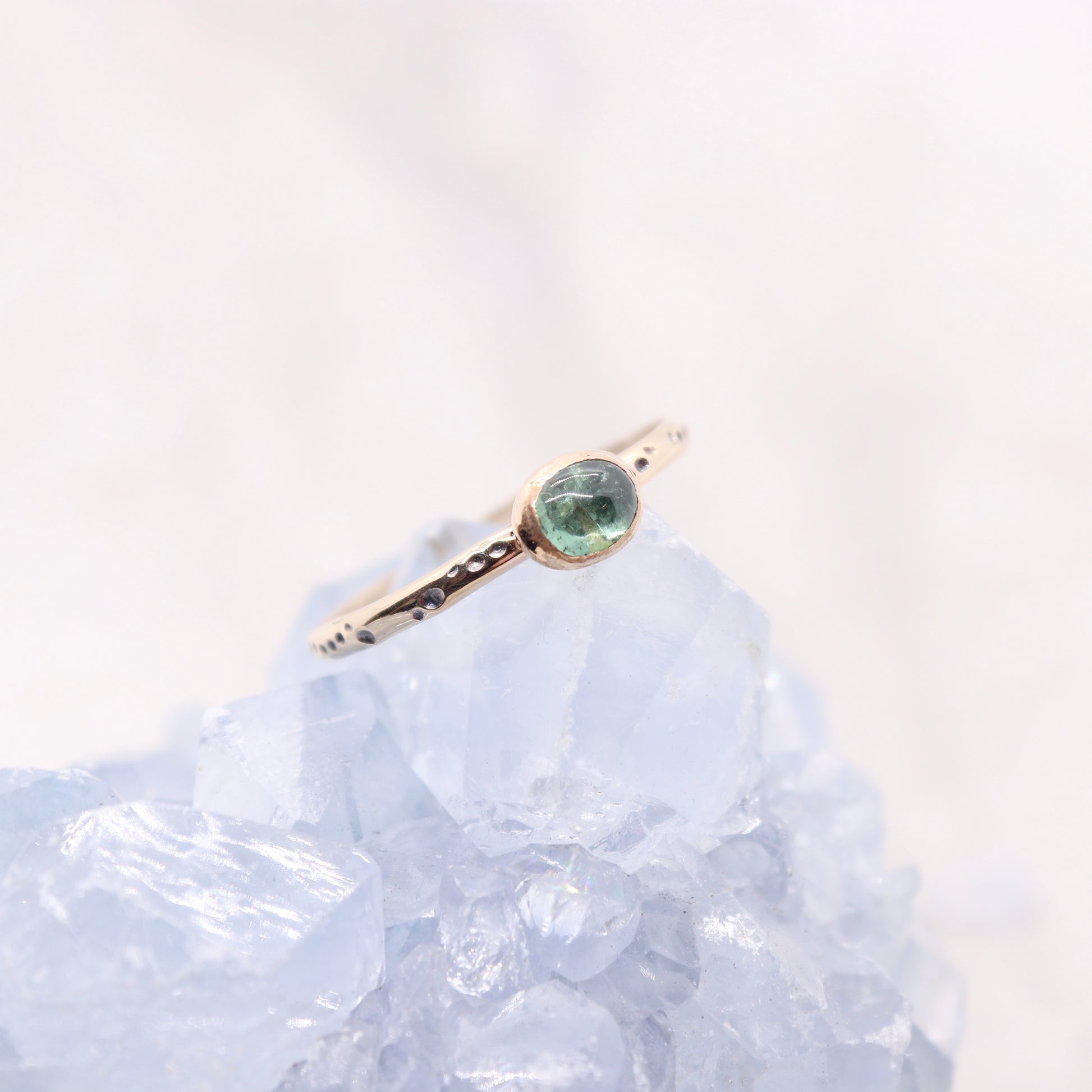 Tourmaline gemstone ring on gold bohemian ring band