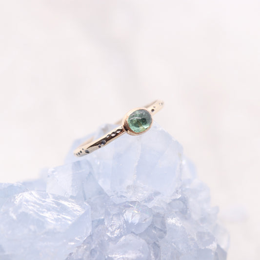 Tourmaline gemstone ring on gold bohemian ring band