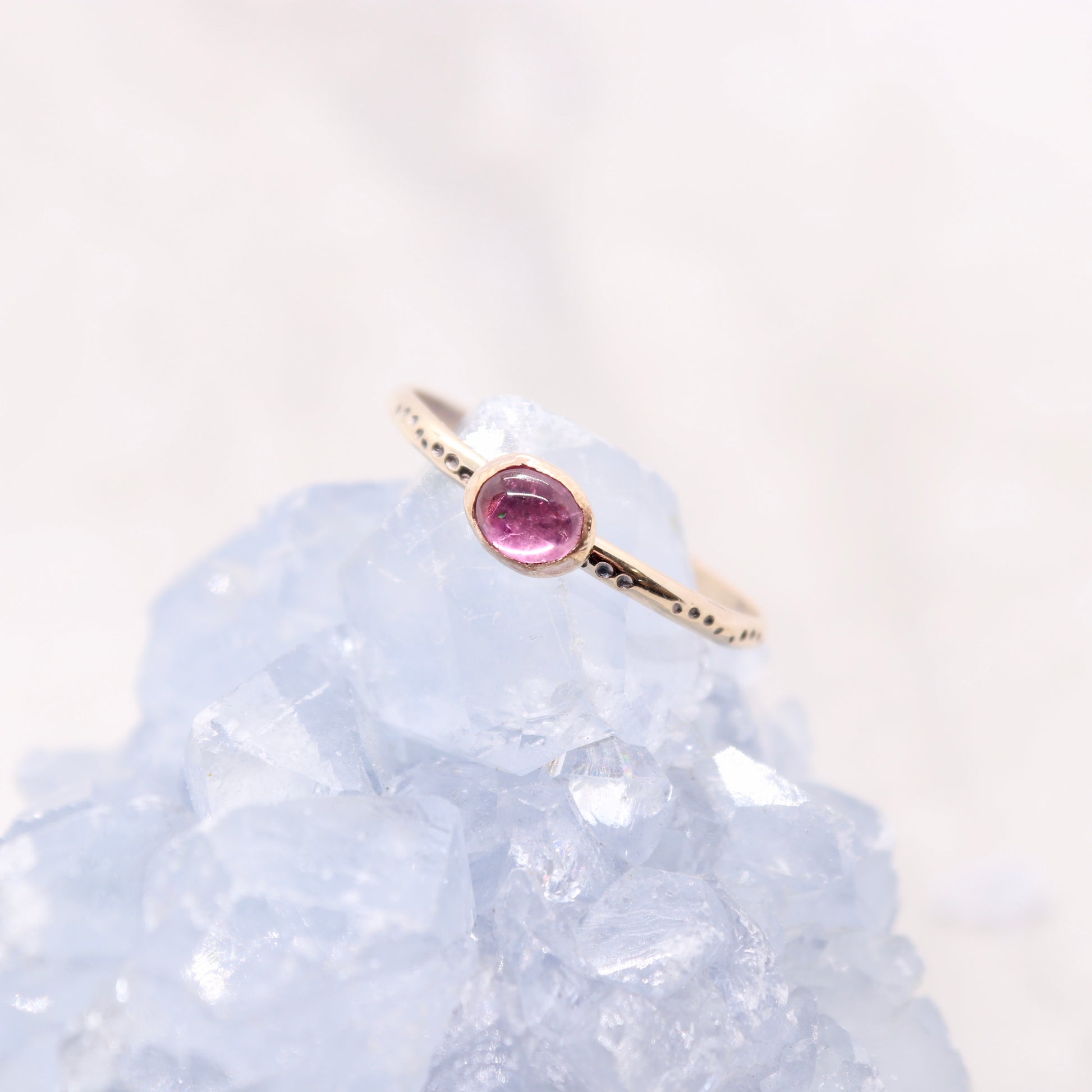 Tourmaline gemstone ring on gold bohemian ring band