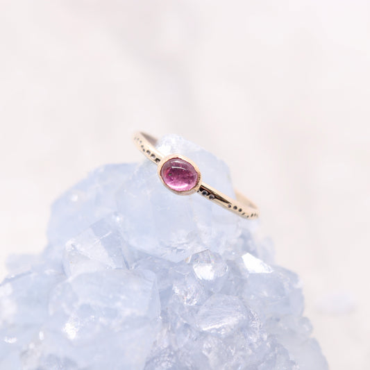 Tourmaline gemstone ring on gold bohemian ring band