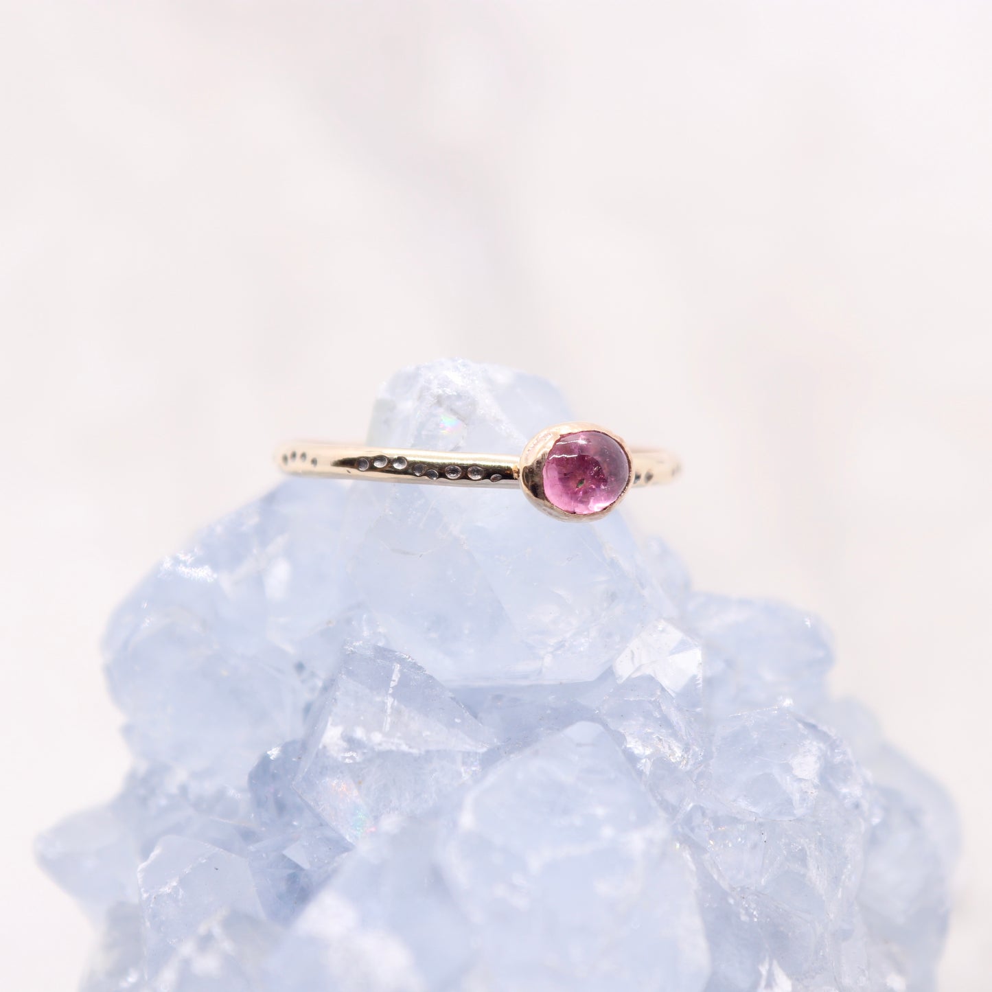 Tourmaline gemstone ring on gold bohemian ring band