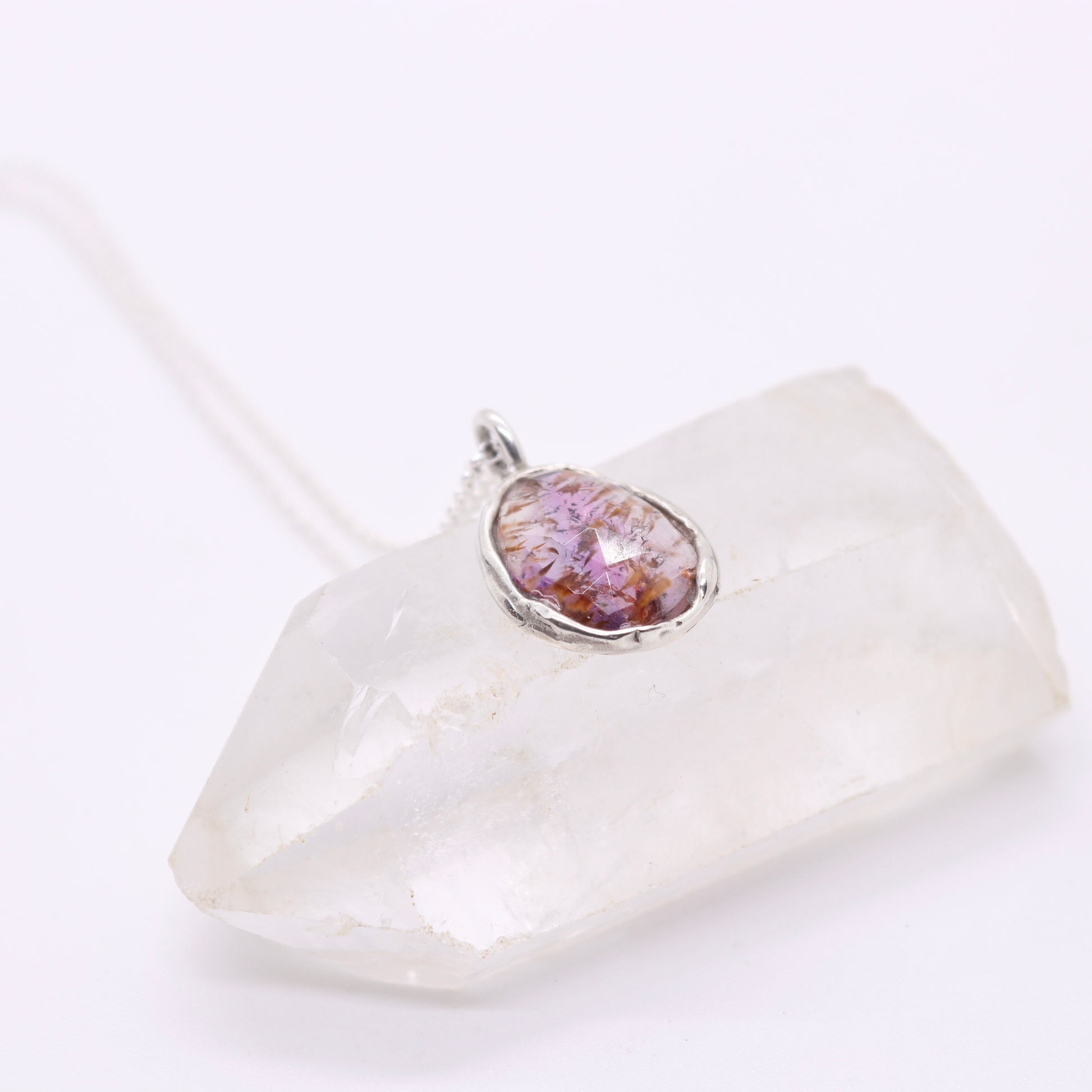 Super 7 melody stone gemstone pendant in organic raw sterling silver