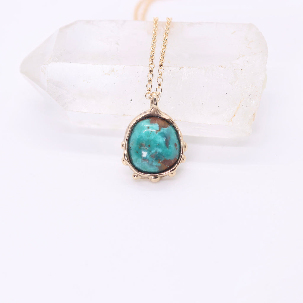 Sierra Nevada turquoise necklace set in solid 14k gold with an organic sculptural bohemian look