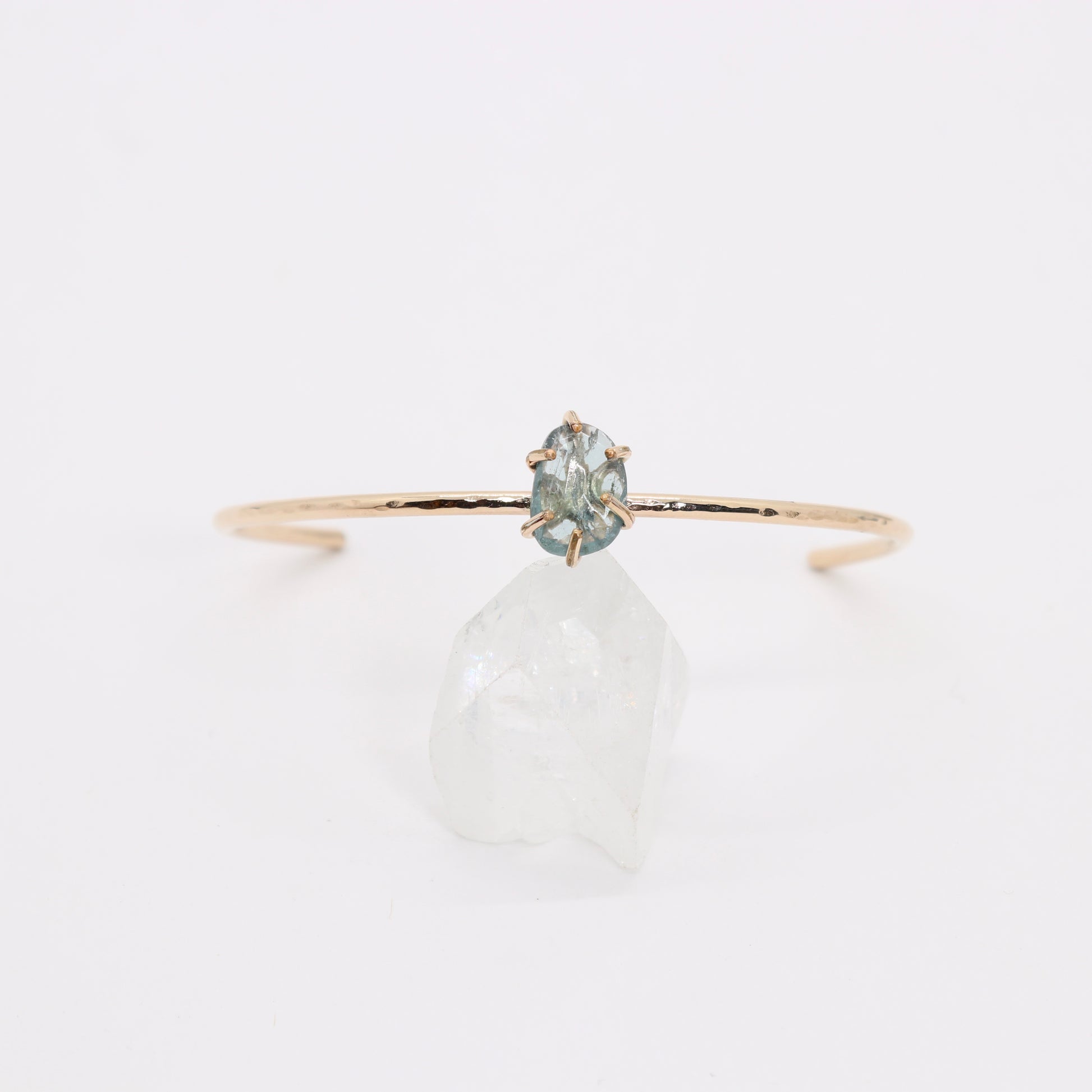 Green tourmaline gemstone set in a 14k gold filled cuff bracelet