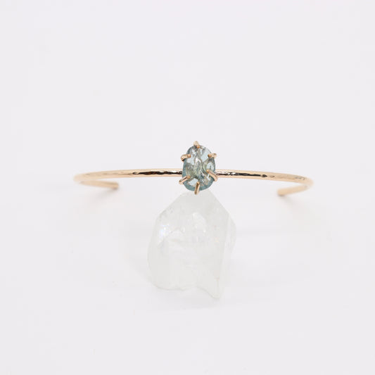 Green tourmaline gemstone set in a 14k gold filled cuff bracelet