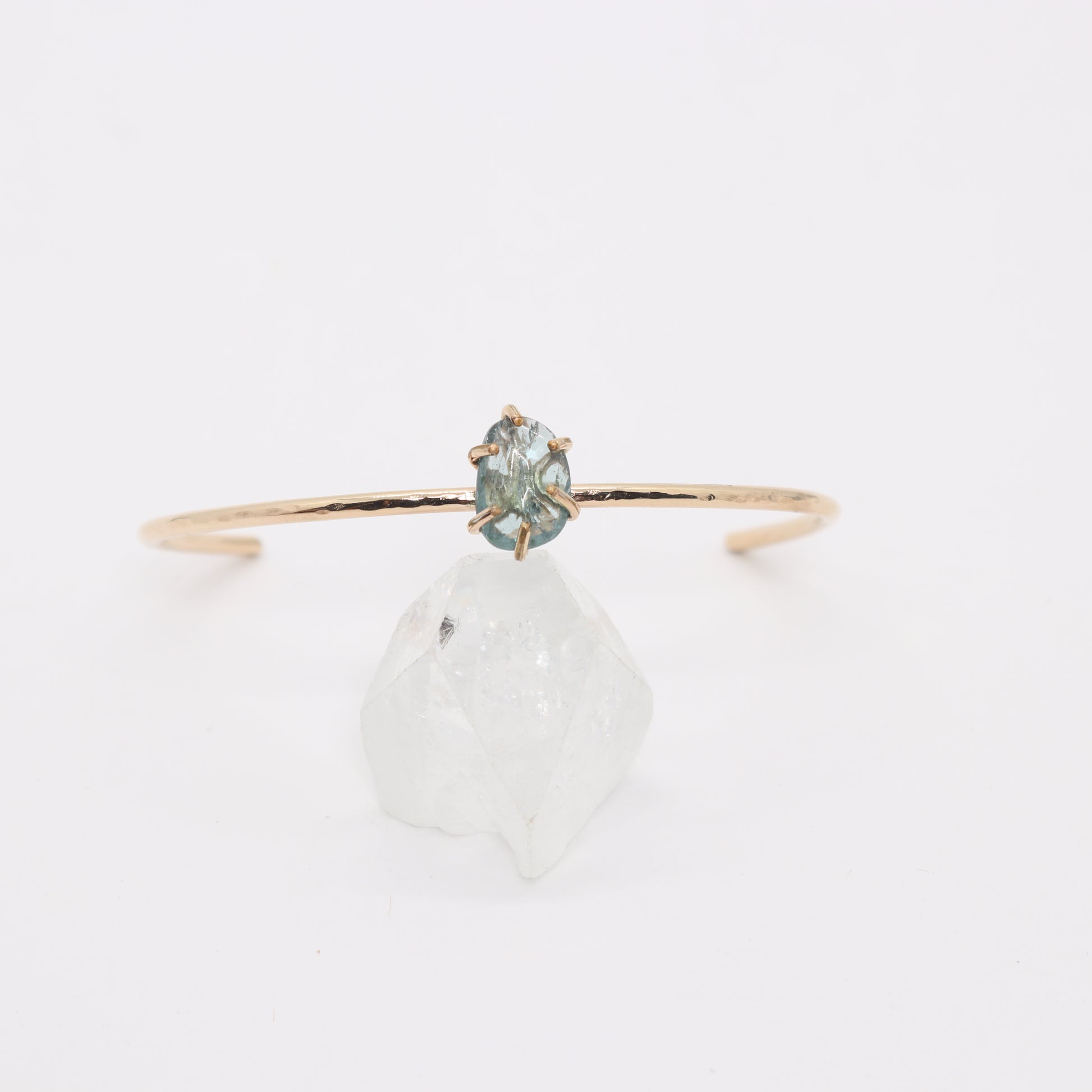 Green tourmaline gemstone set in a 14k gold filled cuff bracelet