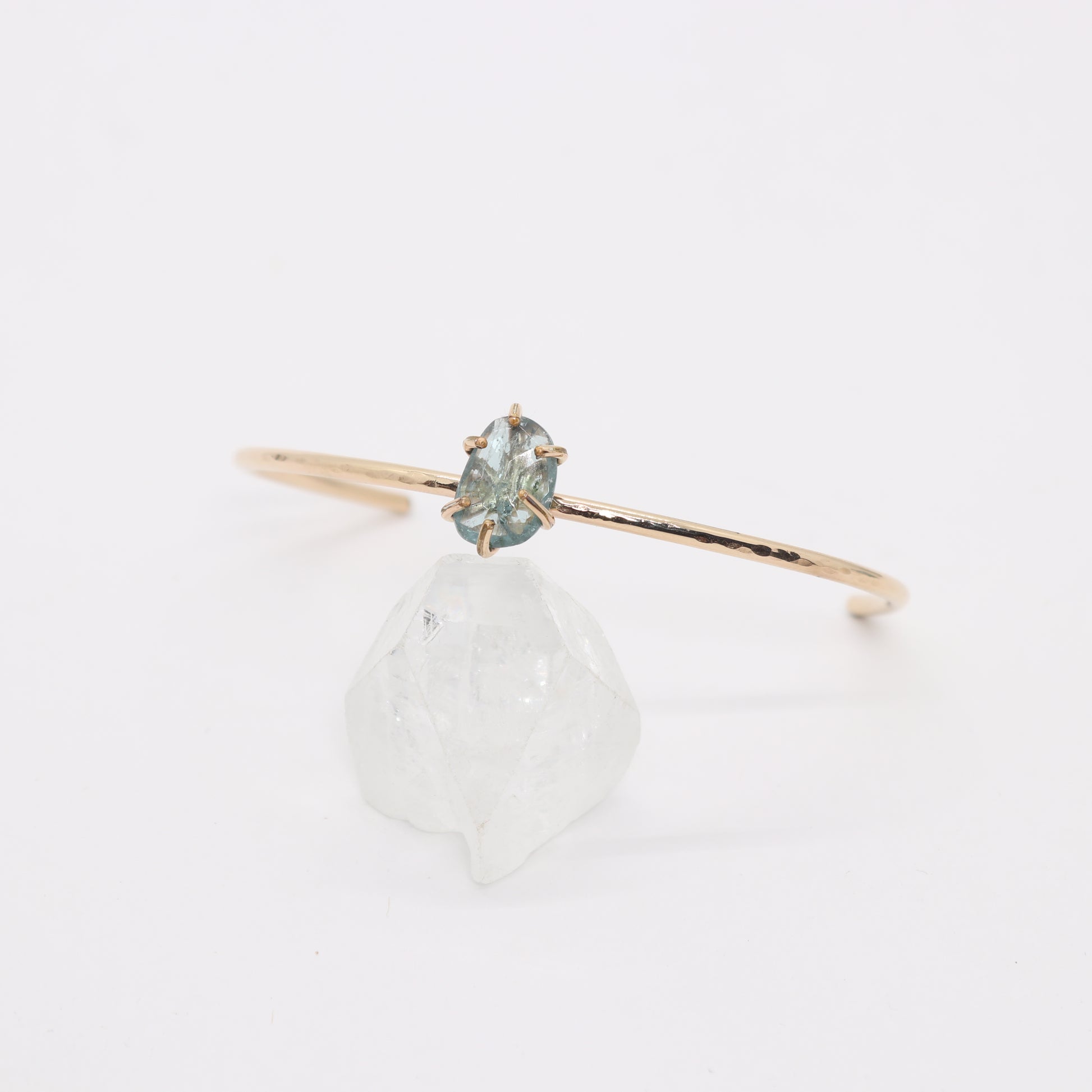 Green tourmaline gemstone set in a 14k gold filled cuff bracelet